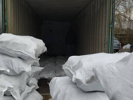 TFN Ventures 25kg bags of used shoes loaded into export container 3