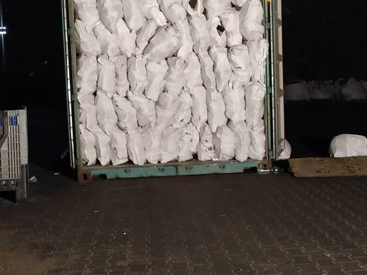 TFN Ventures 25kg bags of used shoes loaded into export container 6